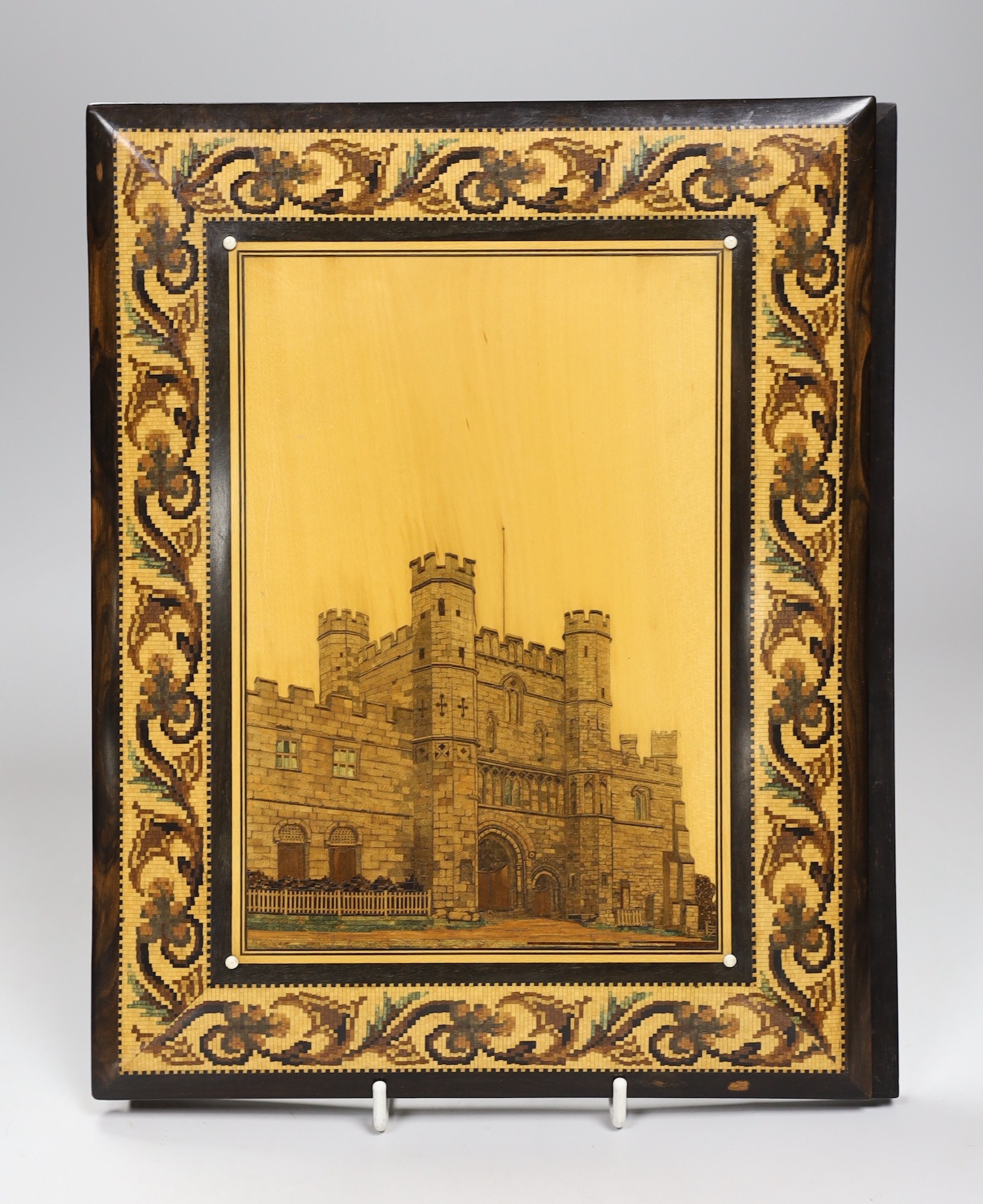 A rare Tunbridgeware rosewood coromandel blotter pad, with gauge-work view of Battle Abbey gateway, 29cm